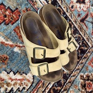 Yellow women’s Birkenstock’s size 37.